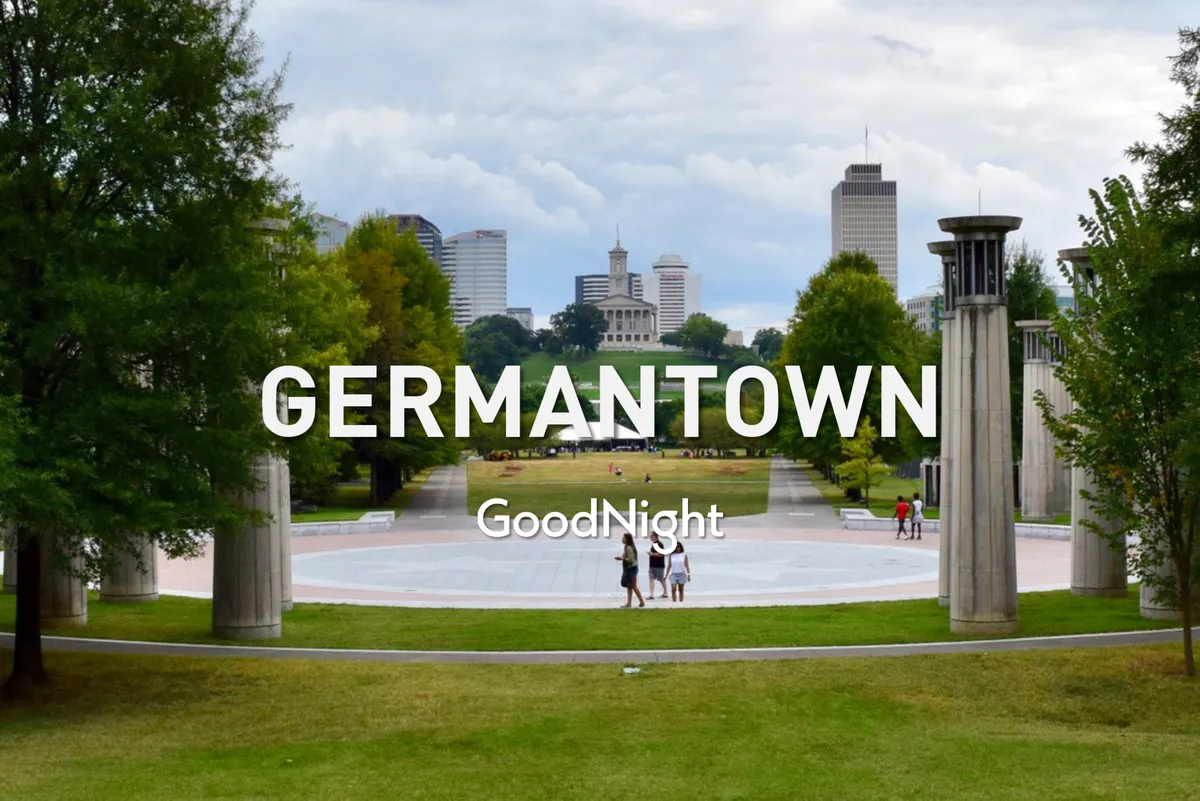 A panoramic view of Nashville's city skyline overlooks an open green space and plaza area, with trees and people relaxing or socializing. The serene atmosphere invites families to unwind and play, highlighting the city's outdoor appeal.